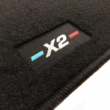 Custom-made BMW X2 U10 (2024-) floor mats with embroidered logo