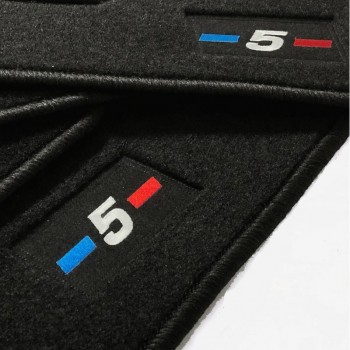 Custom-made BMW Serie 5 G61 Touring (2024-) floor mats with embroidered logo
